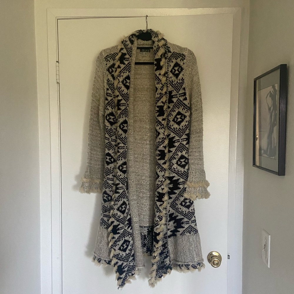 Beautiful Venus duster with fur trim detail.